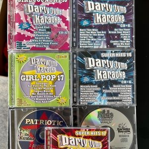 Karaoke cds (7). 5 of the cds are Party Tyme Karaoke brand